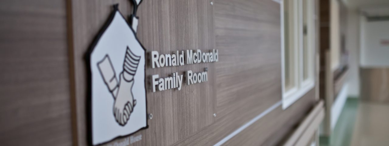 the sign and logo outside of the ronald mcdonald family room