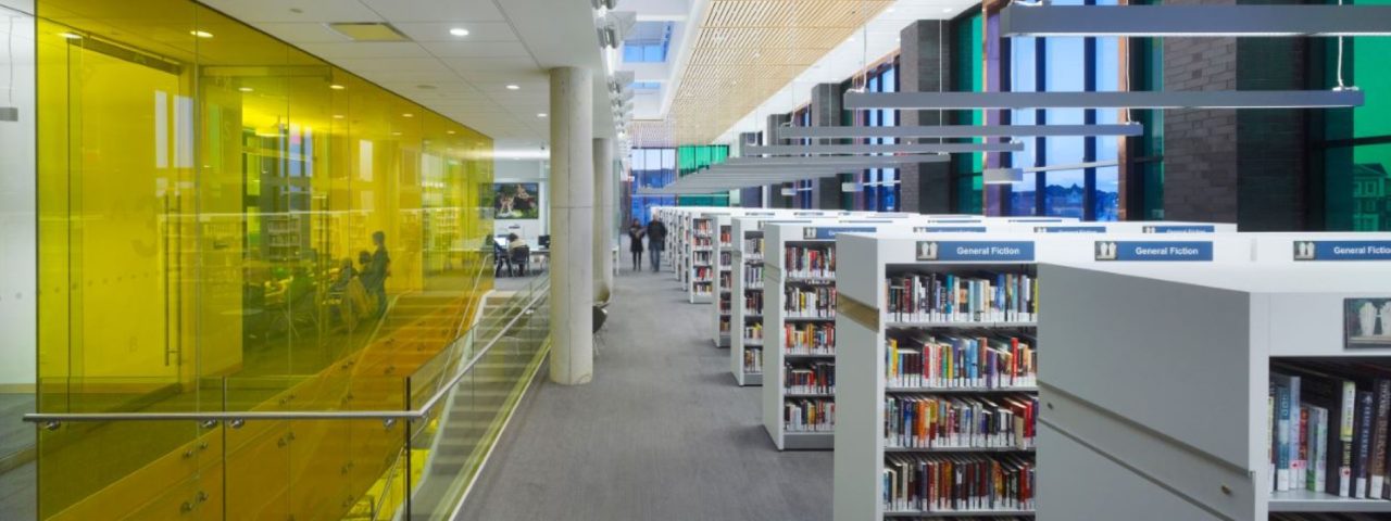 Library hallway with a staircase on the left