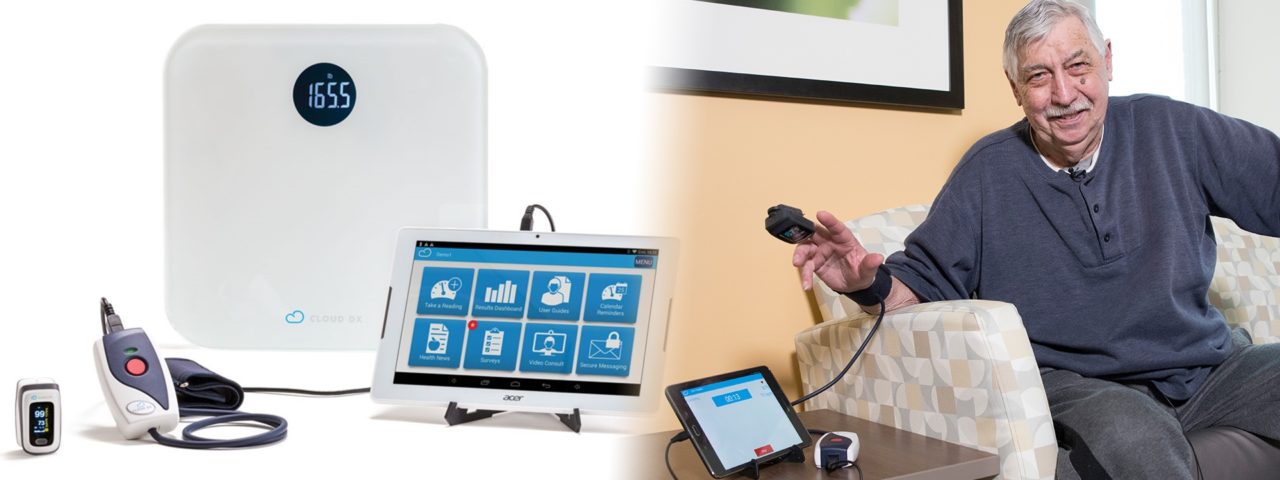 an elderly man sitting on the couch, attached via respiratory monitor to the virtual monitoring service provided by oak valley health