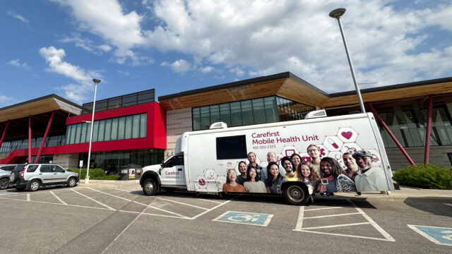 The mobile foot clinic bus parked outside a Markham community centre.