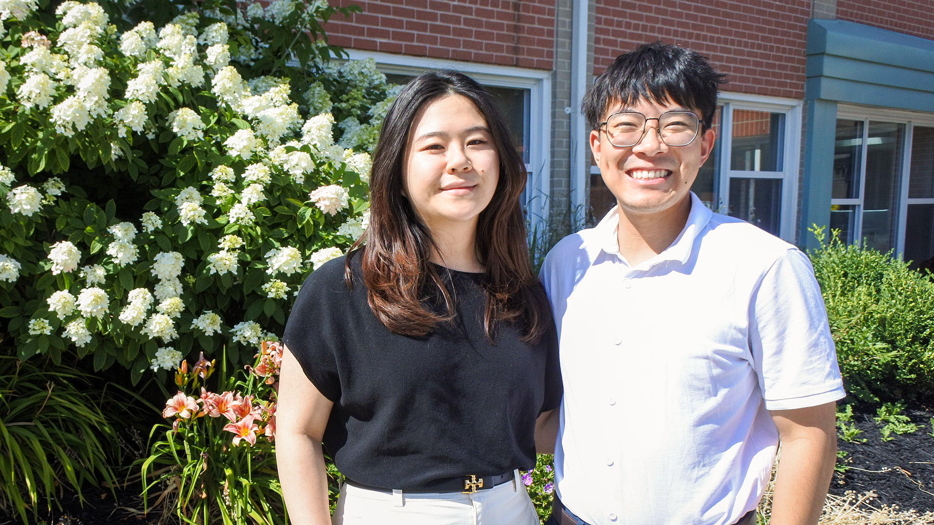 The two new family medicine residents stand outside Uxbridge Hospital.